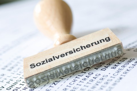 Holzstempel Sozialversicherung
